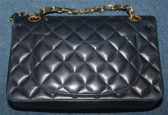 A vintage Chanel dark blue lamb skin quilted handbag,